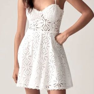 White eyelit mini flare dress. White. New with tags never worn. Dynamite large